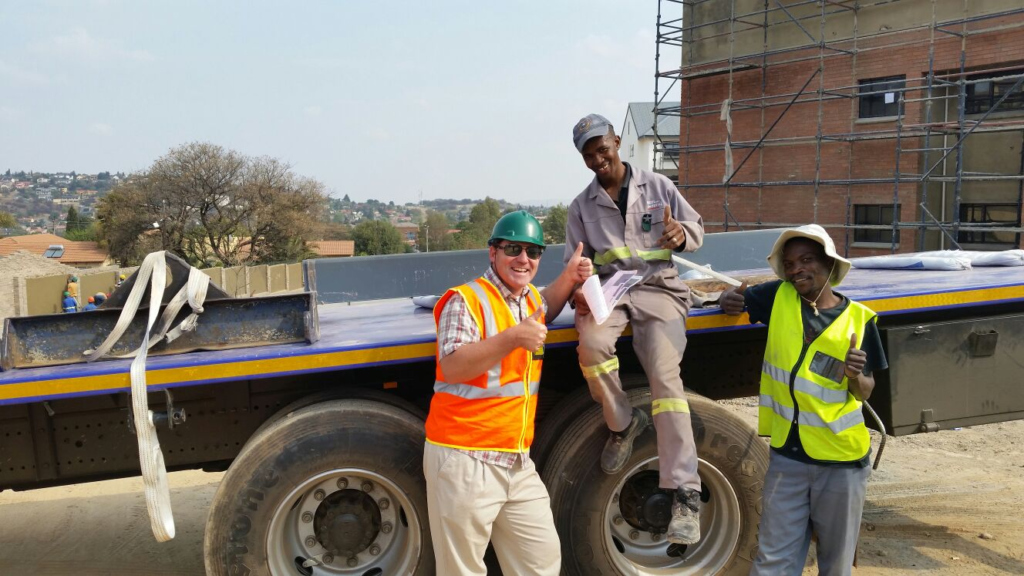 Bradley with a few construction workers.